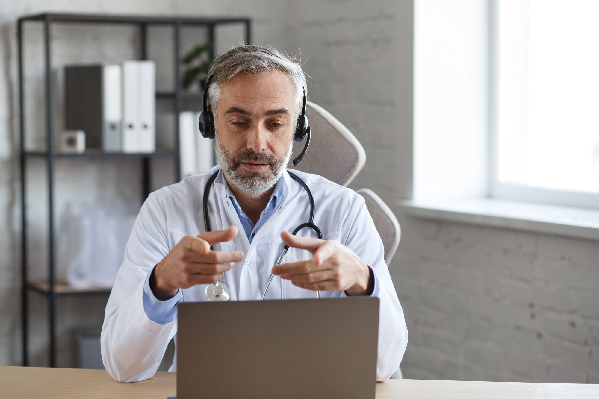 Doctor_telehealth_visit_computer